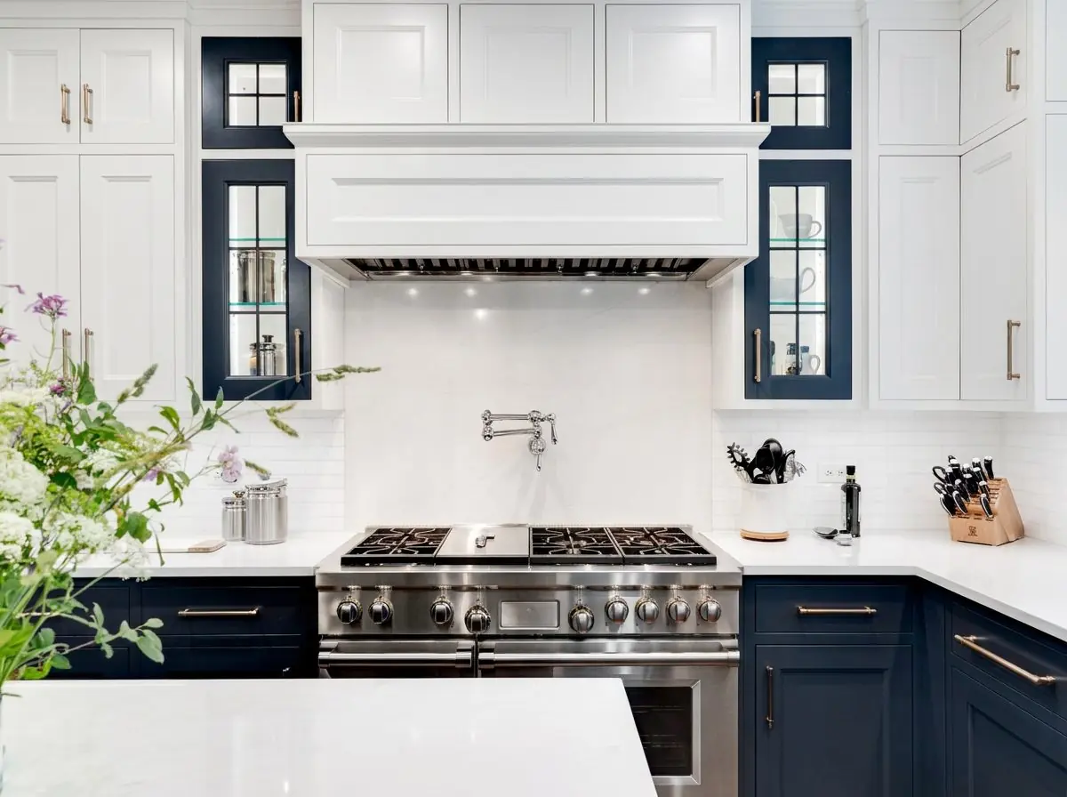 Kitchen remodel with navy and white custom cabinetry