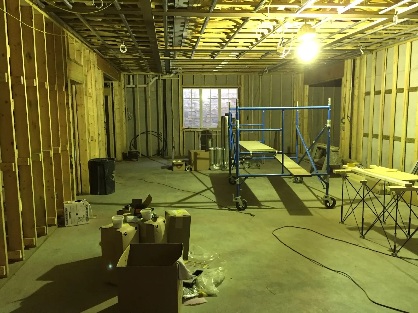 Basement build-out with new framing and mechanicals by Anderson Little Construction